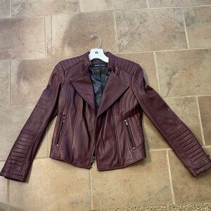 Black rivet, maroon leather jacket XS